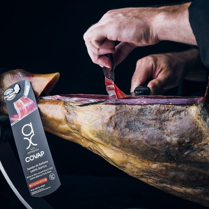 Acorn-Fed 100% Iberico Ham Alta Expresion with black label ham carving by hand by COVAP. Deliberico