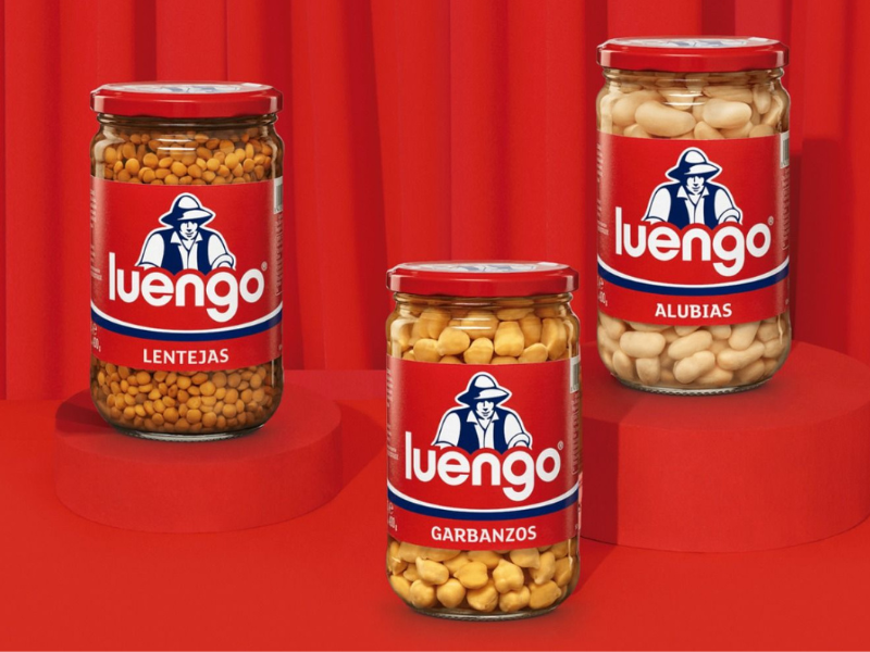 Luengo Cooked jars of garbanzo beans, lentils, white beans on a red background