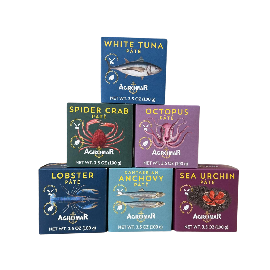 Agromar Pate collection including white tune, spider crab, octopus, lobster, anchovy and sea urchin pate boxes placed one on top of each other like a piramid