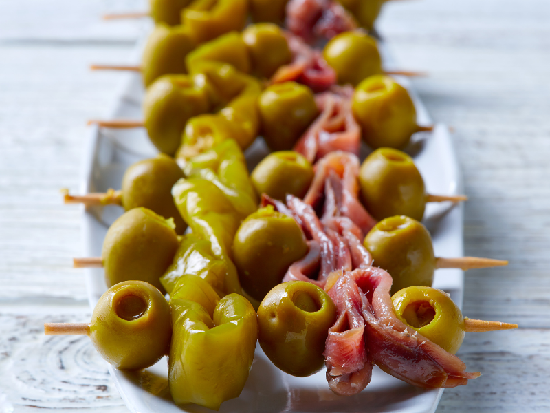 ¨Gilda¨ Pickled peppers skewers with anchovies and olives