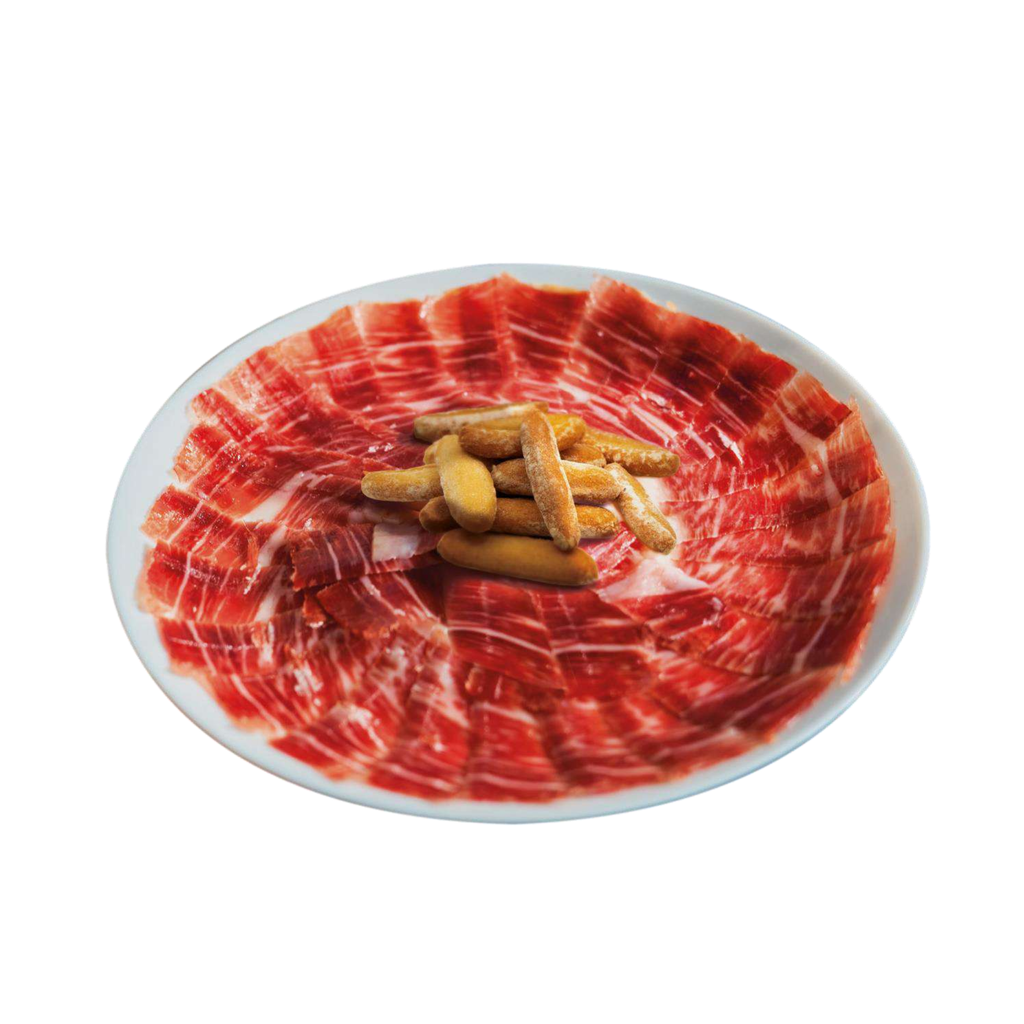 Platter with sliced iberico ham and  obando breadsticks on a white background