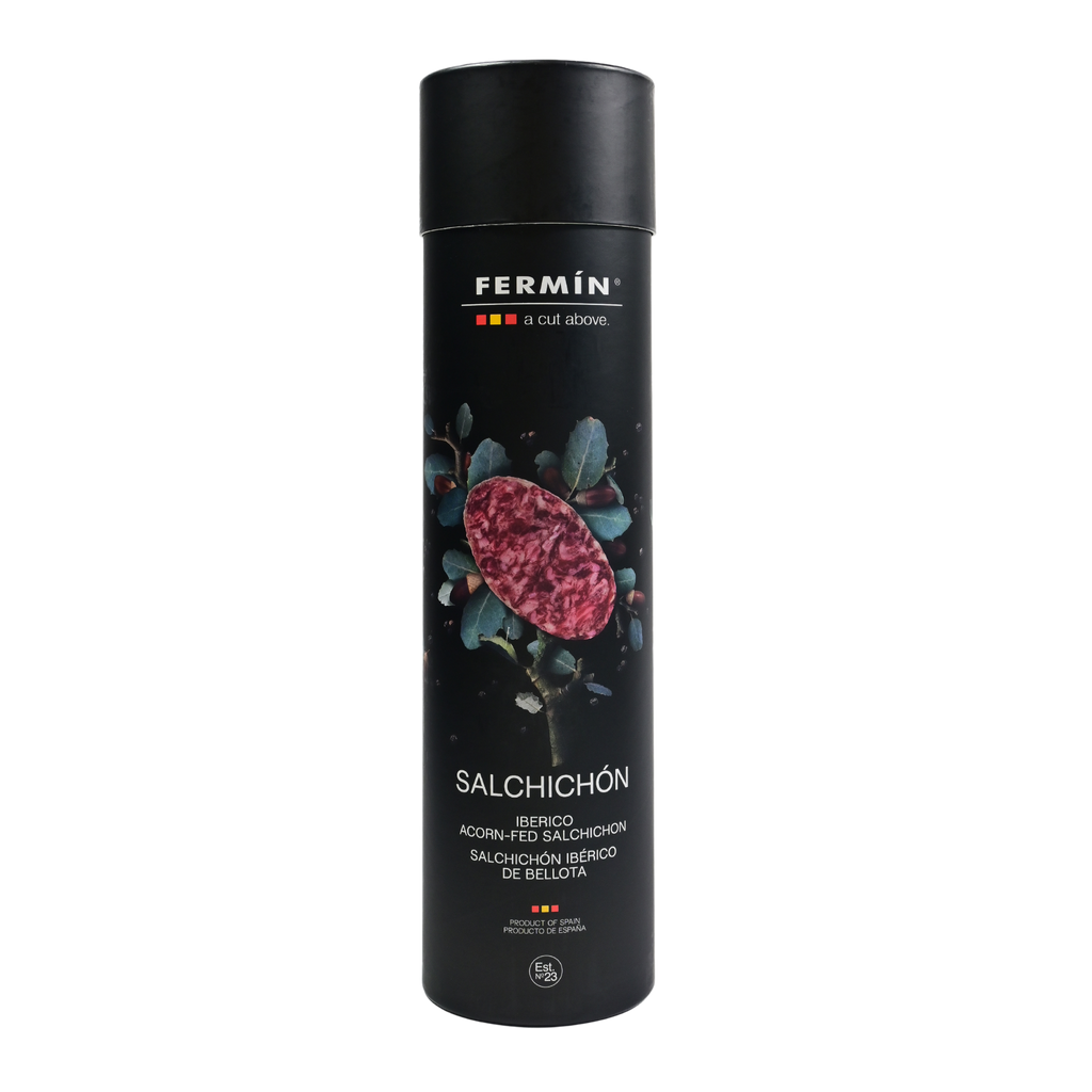 Fermin 100 Iberico acorn fed salchichon in black tube packaging on a Transparent background