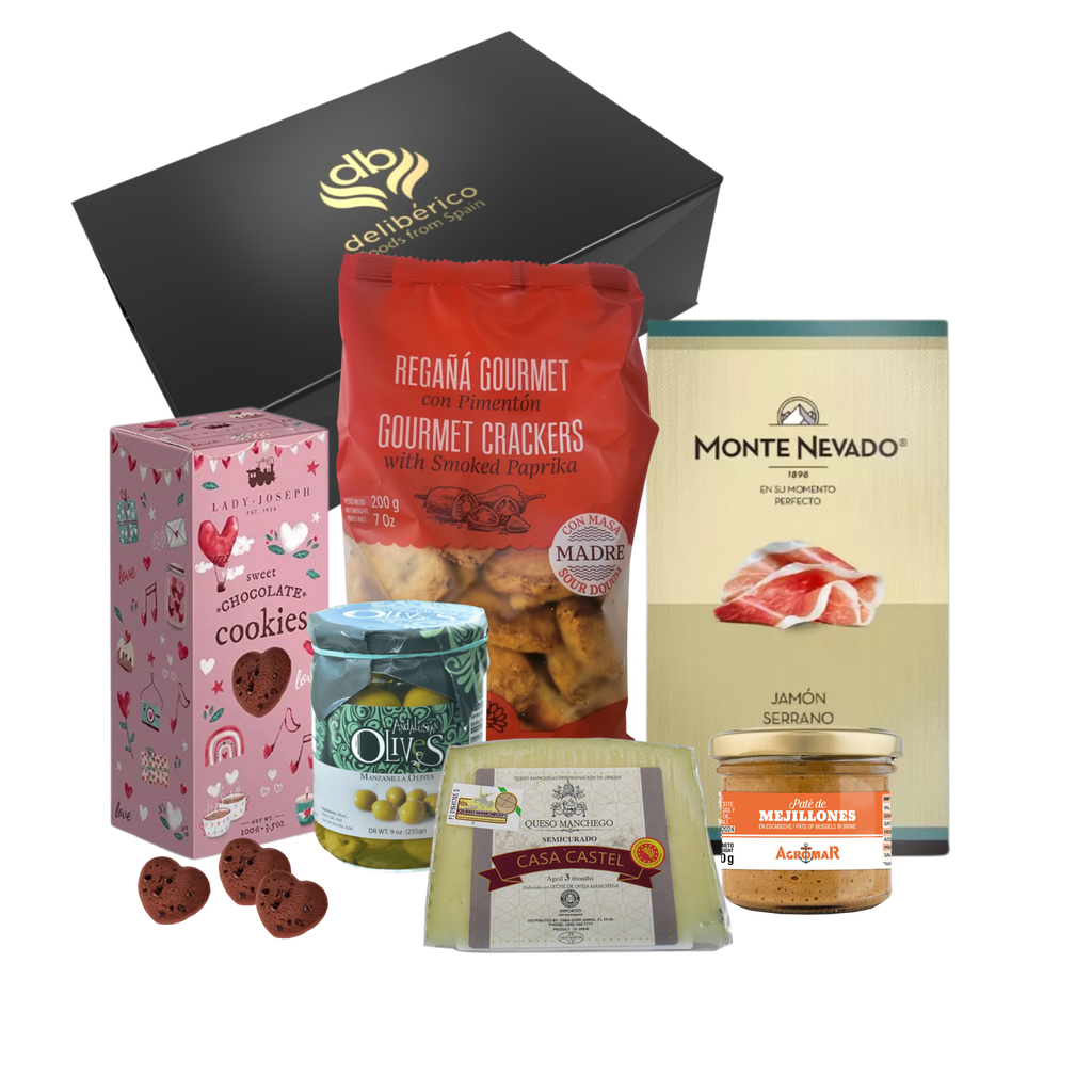 Serrano Gift Box by Deliberico with Serrano ham, manchego cheese, olives, creamy pate, crunchy reganas ans sweet chocolate hearts cookies