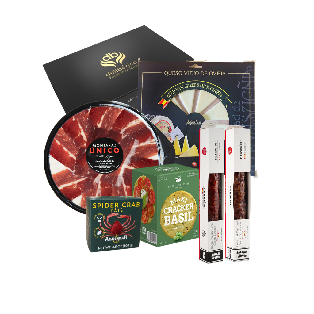 Discover the 'Solera' Gift Box: 100% Iberico Ham, artisanal Chorizo, aged sheep cheese, and Spider Crab Pâté in elegant black and gold packaging. Perfect for any occasion!