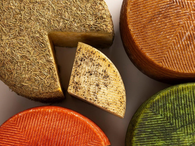 Close-up of diferent cheese wheels from Vega Sotuelamos