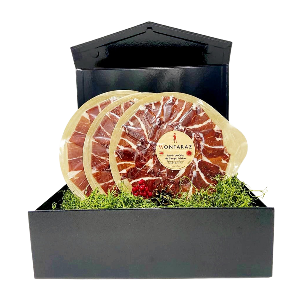 Black Gift box with 3 round packs of free range iberico ham by Montaraz. Deliberico