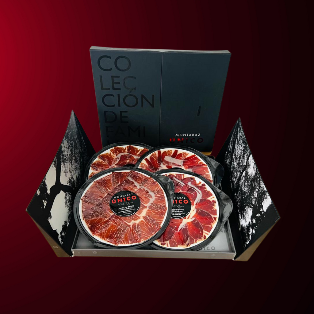 Family collection black gift box open with 4 packs of Unico iberico ham plate stylewith red background by Montaraz. Deliberico
