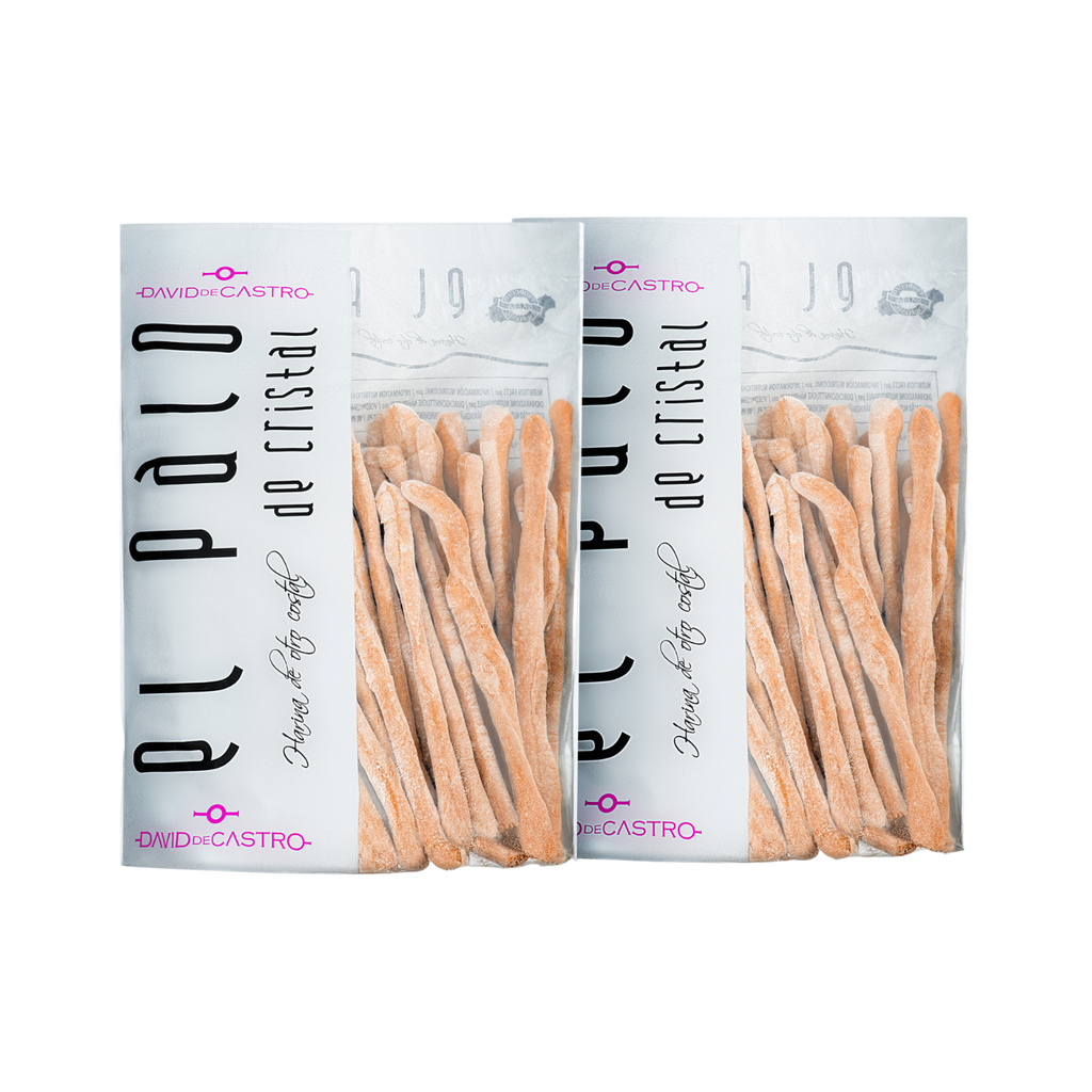Two packages of Palo de cristal Bread sticks white bag with transparent side to see product. Deliberico