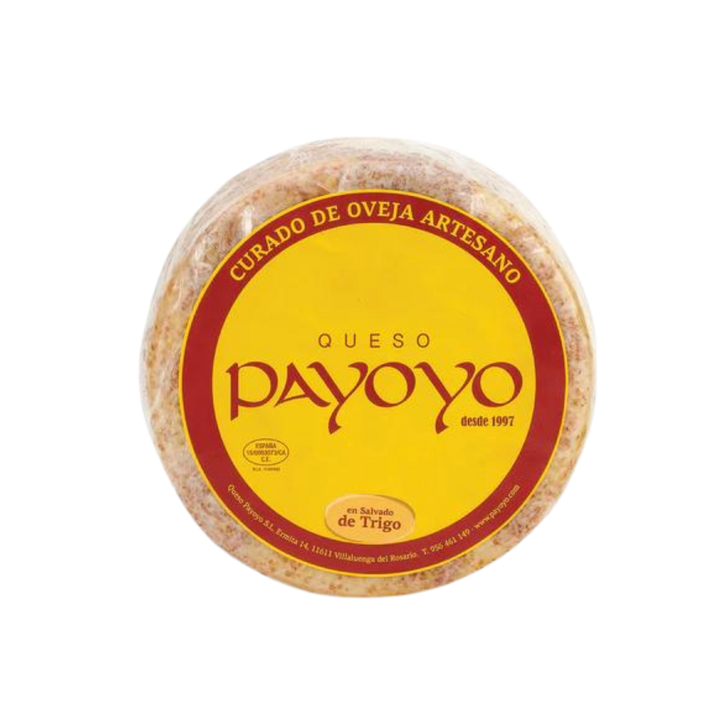 Payoyo wheel cheese sheep milk with yellow and red trimmed label. Deliberico 