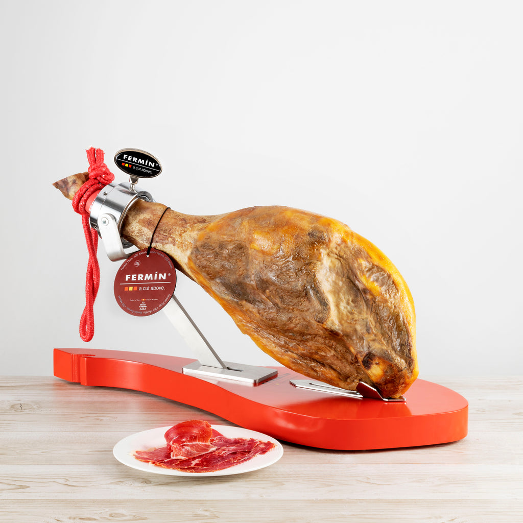 Serrano Ham  bone in on ham holder and a ham plate by Fermin. Deliberico